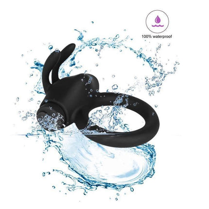 Neptune Vibrating Ring Silicone Rechargable USB surrounded by splashing water, highlighting its waterproof feature and bunny-ear design.