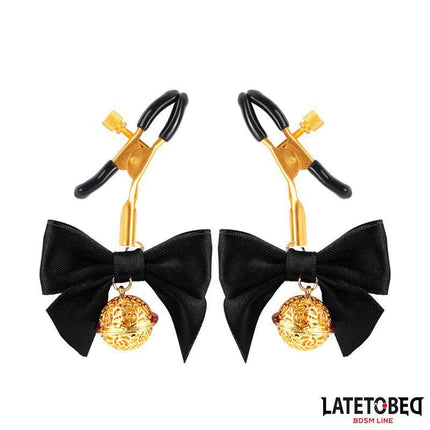 Nipple clamps with Bow Black featuring adjustable clamps, black bows, and gold bells from Latetobed BDSM Line.
