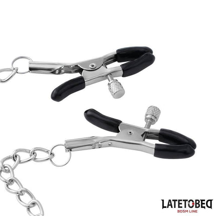 Nipple Clamps with Daddy Word Pendant featuring sleek metal clamps and a chain connector for intimate and playful couples' exploration.