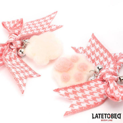 Nipple Clamps with Kitty Paw Pompon from Latetobed BDSM Line with pink bows for playful and intense experiences.