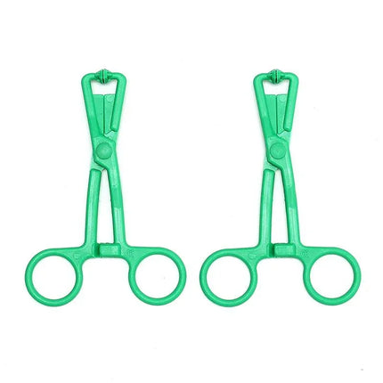 Green tweezers-style Nipple Clamps for precise stimulation and enhanced intimate play.
