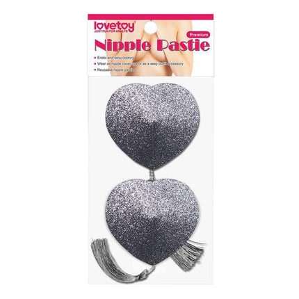 Nipple Covers Reusable Silver Glitter with heart shape and tassels, perfect for a seamless silhouette in any outfit.