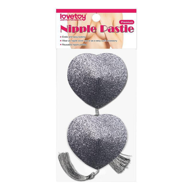 Nipple Covers Reusable Silver Glitter with heart shape and tassels, perfect for a seamless silhouette in any outfit.