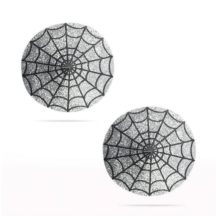 Nipple Covers Reusable Spider Pattern Silver with glittery finish, designed for discreet wear under sheer fabrics and festival outfits.