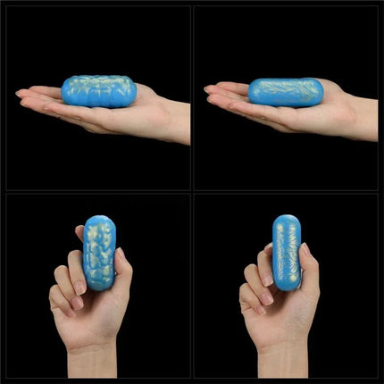 Person holding Oceans Toner Kegel Balls Set of 2, showcasing dual-weight design for progressive pelvic floor strengthening exercises.