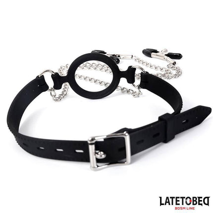 Open Mouth Gag with Nipple Clamps from Latetobed BDSM collection featuring adjustable strap and chain attachments.