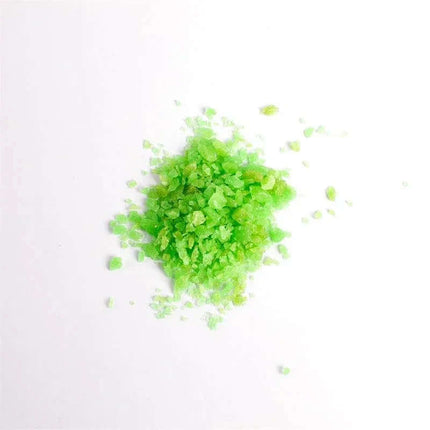 Green Oral Sex Popping Candies 1 Sachet Mint Flavor scattered on white background