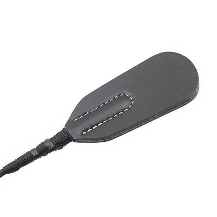Oval Crop 45 cm riding crop with black leather and handle, crafted for precise control and upscale style in BDSM use.