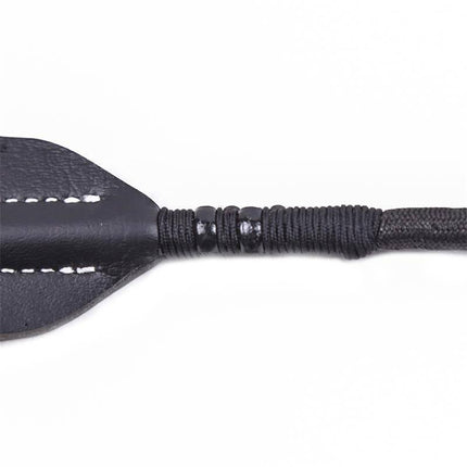 Close-up of black oval riding crop 35cm from Latetobed BDSM Line showing handle texture and oval tip.