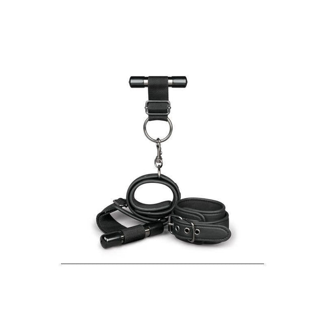 Over the Door Wrist Cuffs in black faux leather with soft foam padding, designed for comfortable and secure restraint.