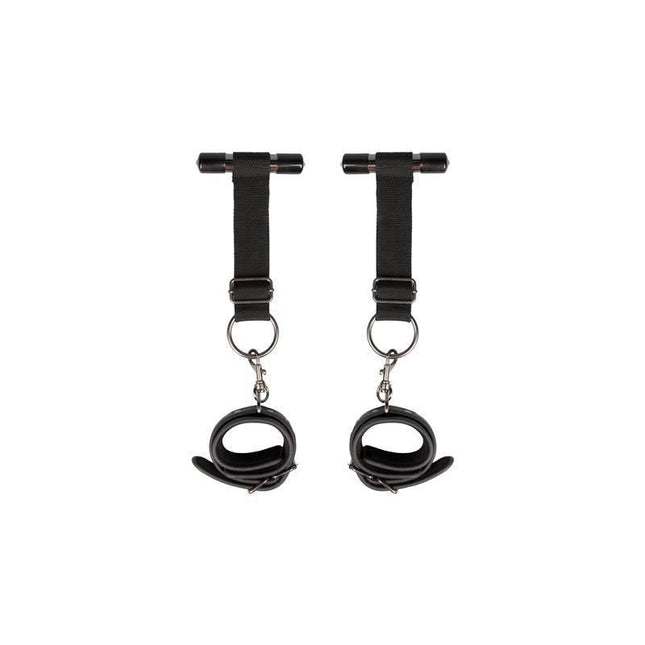 Over the Door Wrist Cuffs in black faux leather with foam interior, featuring adjustable straps for comfortable and secure restraint.