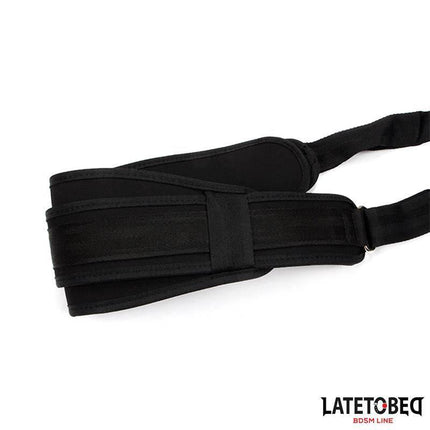Black Pad Door Jam Sling for BDSM play over a white background