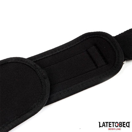 "Close-up of Pad Door Jam Sling showing adjustable padded strap for secure over-door support"