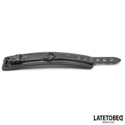 Padded Handcuffs Adjustable in black leather for comfortable, stylish restraint, adjustable from 20 to 30 cm with padded interior.