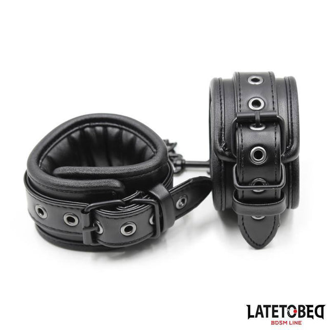 Padded Handcuffs Adjustable in black, designed for comfortable and secure use, featuring padded interior and adjustable length.