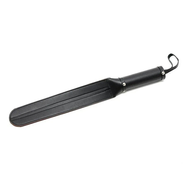Paddle Leather 48 cm BDSM accessory with black leather finish, smooth surface, and ergonomic grip for precise handling.