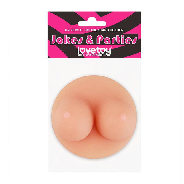 Party Accessorie Universal Boobie Stand Holder Boobies in packaging, designed for humor at adult parties, features silicone material.