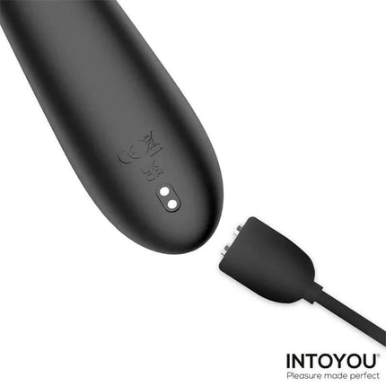 Close-up of Patty Vibrator with Rotating Ball charging cable feature, showing ergonomic design, enhancing pleasure experiences.