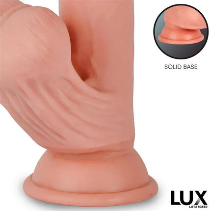 Close-up of Paul Triple Density Dildo with Swinging Balls 8.2 showing its solid base for stability and realistic texture by Lux.