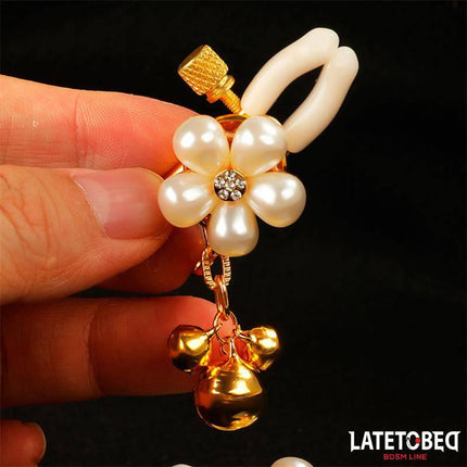 Close-up of Pearl Nipple Clamps with floral pearl design from the Latetobed BDSM line.