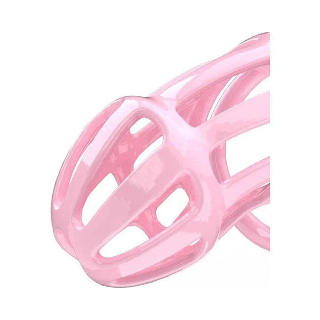Close-up of the Penis Cage PC02 Pink made from high quality ABS material, featuring an ergonomic design and multiple rings for a comfortable fit.