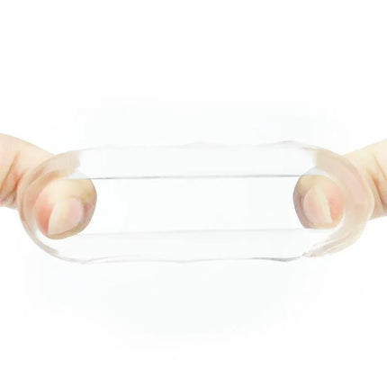 Elastic TPE Penis Ring Power Plus Clear being stretched for demonstration of flexibility and comfort