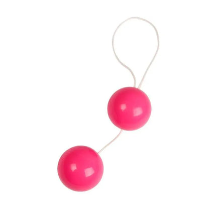 Pink double kegel balls on a string for pelvic floor exercise