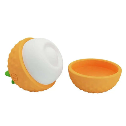 Pineapple Secret Thumping Stimulator in orange and white, flexible tip, compact and discreet design, perfect for external stimulation.