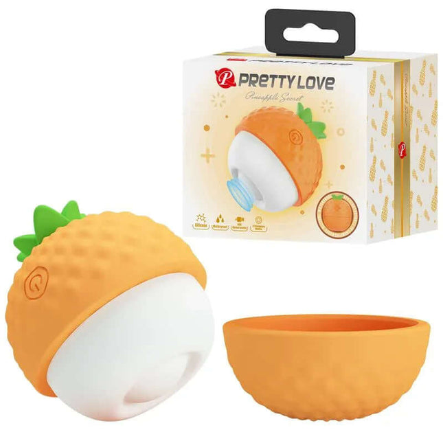 Pineapple Secret Thumping Stimulator with packaging, orange and white design featuring a cute pineapple-like shape and soft-touch surface.