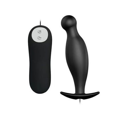 Plug Anal con 12 Patrones de Vibración - Compact black plug with remote control for adjustable sensations, beginner-friendly use.