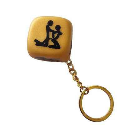 Position Dice Keychain for Exciting Intimate Moments featuring a gold dice with a suggestive icon and keyring chain for playful use.