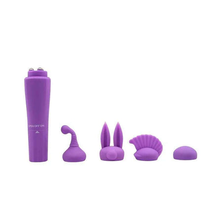 Purple 4-Head Stimulator Vibrator with interchangeable silicone heads for versatile pleasure and deep vibrations.