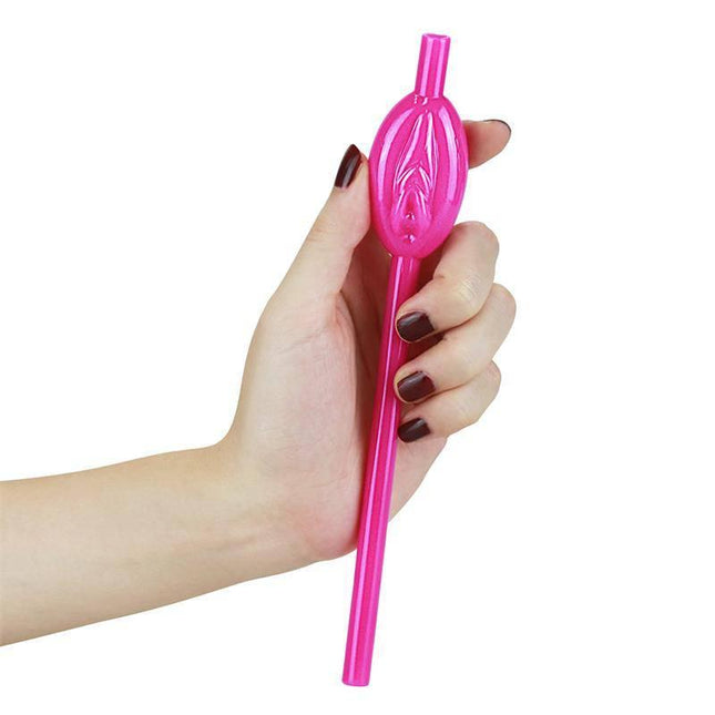 Person holding a pink vagina-shaped straw from the Pussy Straws Pack of 9.