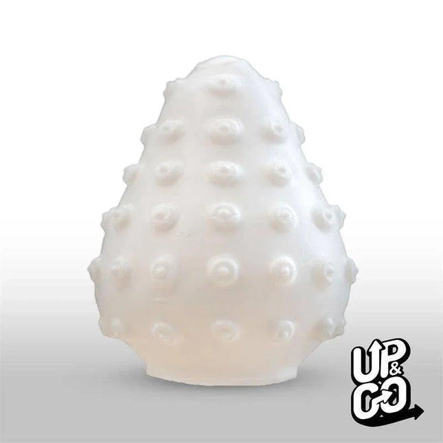 Close-up of Randy Masturbator Egg with textured casing for enhanced pleasure, designed for portability and discreet use.