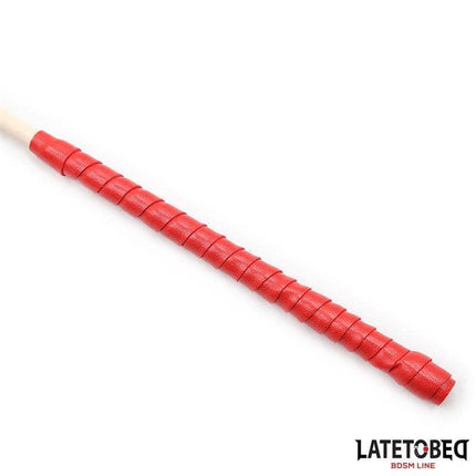 Rattan Cane 60cm with vivid red handle, lightweight and balanced for styling, made from natural rattan, elegant design.