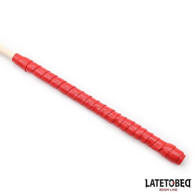 Rattan Cane 60cm with vivid red handle, lightweight and balanced for styling, made from natural rattan, elegant design.
