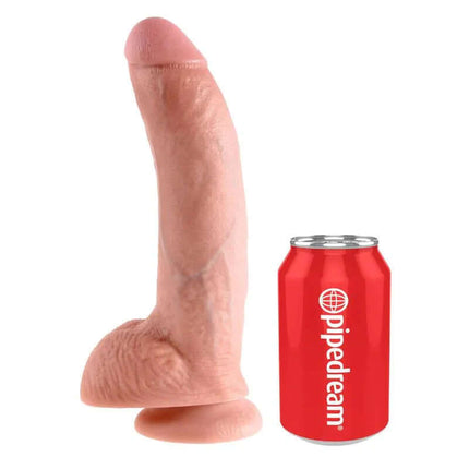 Reaslitic Dildo with Testicles 9 next to a soda can for size comparison, showcasing lifelike texture and handcrafted details.