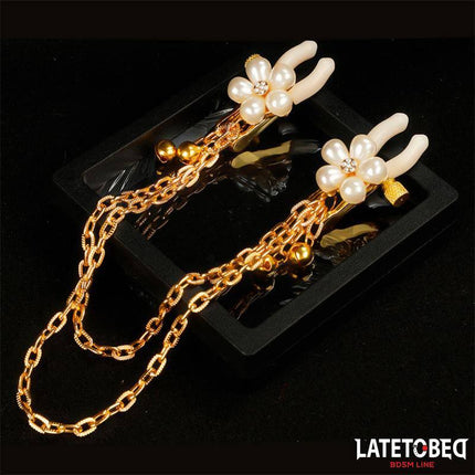 Rearal nipple clamps with Chain from Latetobed BDSM line featuring elegant pearl accents and adjustable gold chain for enhanced pleasure.