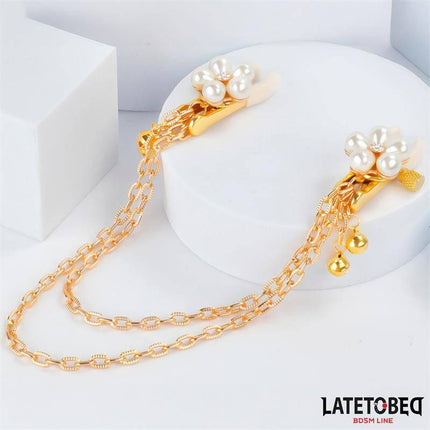 Rearl nipple clamps with Chain from Latetobed BDSM Line, featuring elegant pearl details and adjustable gold chains.