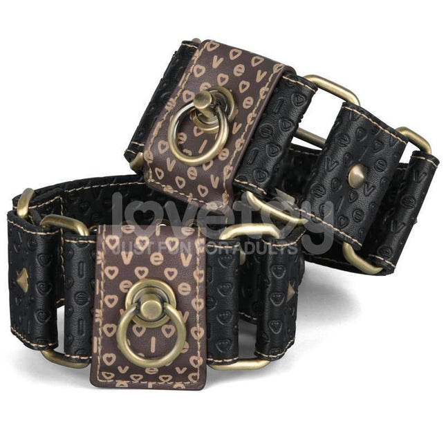 Rebellion Reign Ankle Cuffs with bronze spikes, premium PU material for bondage enthusiasts, luxury rustic look.
