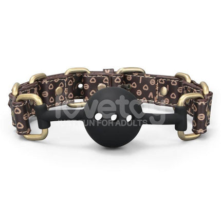 Rebellion Reign Breathable Silicone Ball Gag with antique bronze spikes and dark brown faux leather