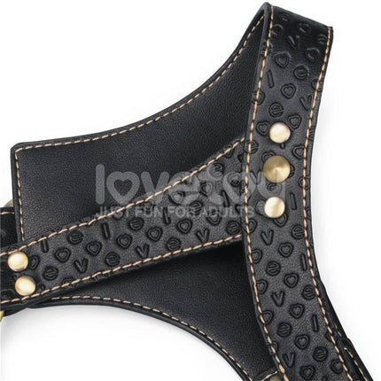 Close-up of Rebellion Reign Full Body Harness crafted in premium PU faux leather with edgy design and gold studs for stylish durability.