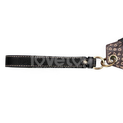 Rebellion Reign Love Paddle 15 dual-sided tool with ergonomic leather handle for customizable intimacy and impact play.