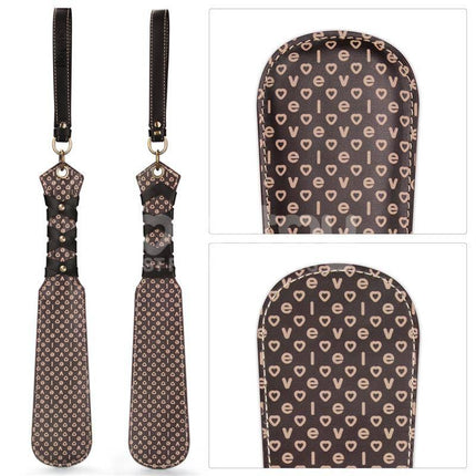 Rebellion Reign Love Paddle 15 with dual-surface design, showing ergonomic handles and love pattern details.