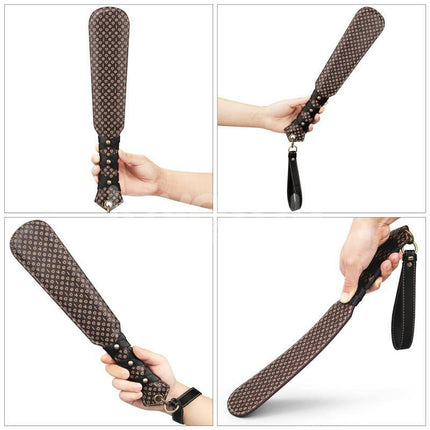 Rebellion Reign Love Paddle 15 shown with dual-surface design for customizable sensation and ergonomic handle for secure grip.