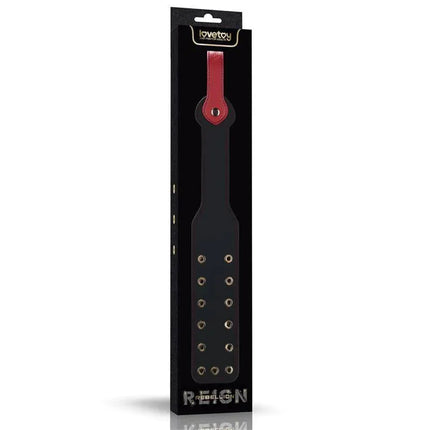 Rebellion Reign Paddle Dual-Branch 15 in original packaging, showcasing premium PU construction and striking two-branch design for intimate play.