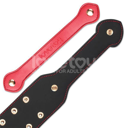 Rebellion Reign Paddle Dual-Branch 15 black and red design for intimate play with durable PU construction.