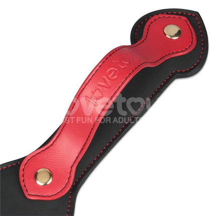 Close-up of Rebellion Reign Paddle HOE 15 with red and black design, showcasing durable PU material and double-sided HOE cut-out.