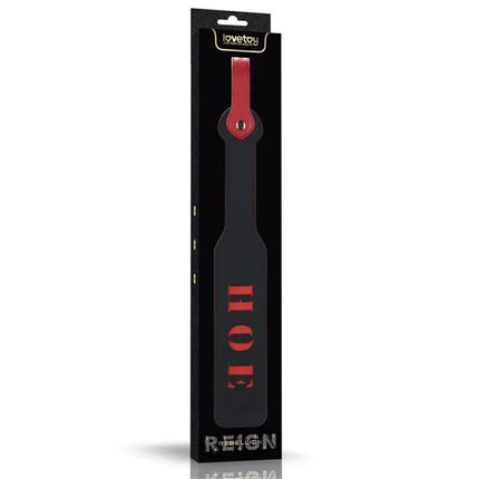 Rebellion Reign Paddle HOE 15 in packaging with durable PU construction and provocative HOE cut-out design for impactful play.