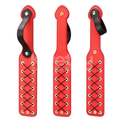 Rebellion Reign Rope Paddle 15 with red design and crisscross woven rope for enhanced sensations.